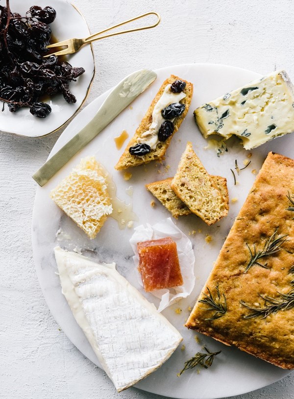 Roasted hazelnut and rosemary cake with cheeses and muscatels in Marsala syrup