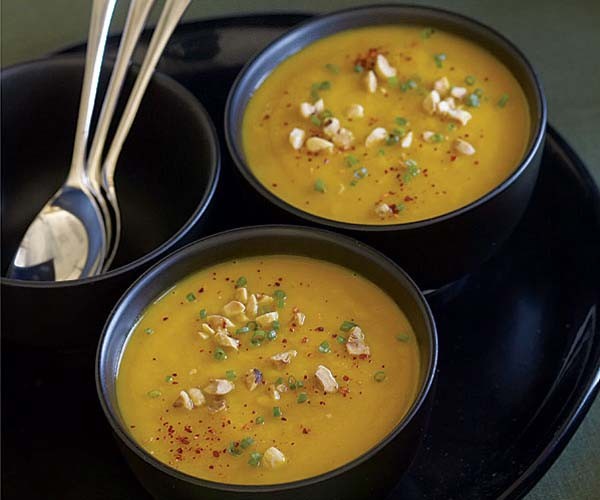 Roasted Hubbard squash soup with hazelnuts and chives