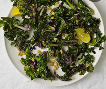 Roasted kalettes with pine nuts & currants