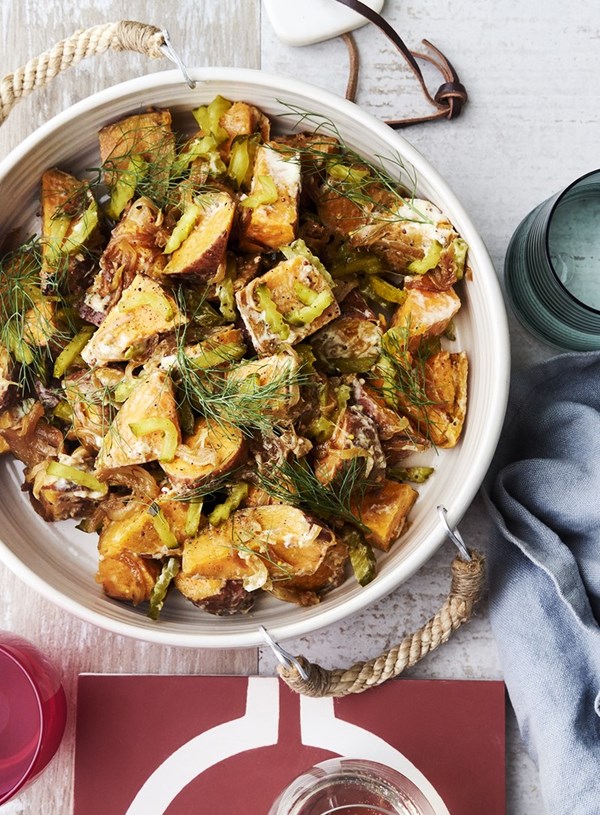 Roasted kumara, caramelised onion and herb salad