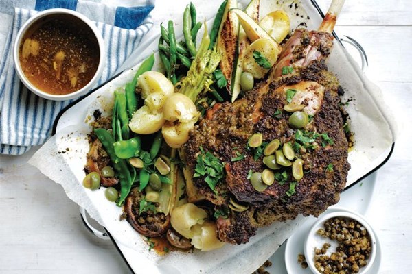 Roasted lamb leg with lemon, olives and spring veg