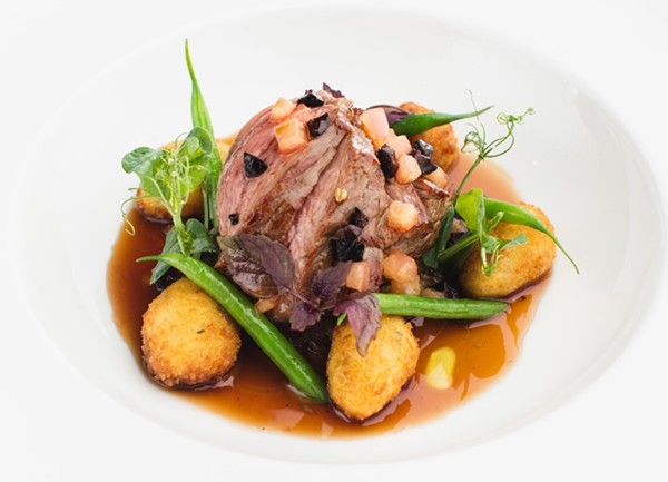 Roasted lamb rump, potato gnocchi, fine beans and black olives