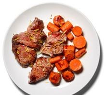 Roasted lamb with cumin, lemon zest and carrots