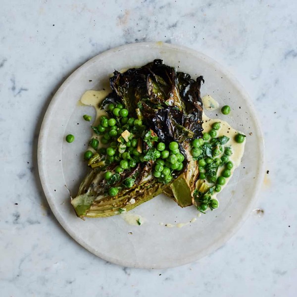 Roasted little gems with peas, parsley and cream