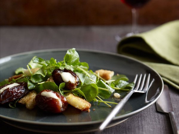 Roasted mascarpone-filled dates with watercress and brioche