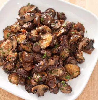 Roasted mushrooms with harissa and mint
