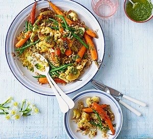 Roasted new carrots, cauliflower, grains & carrot-top dressing