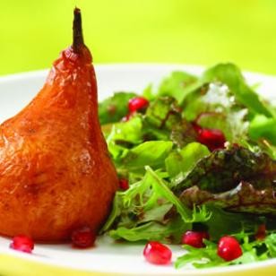 Roasted pear & arugula salad with pomegranate-chipotle vinaigrette