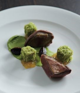 Roasted pigeon with pistachio, orange tapioca and dried fruit paste