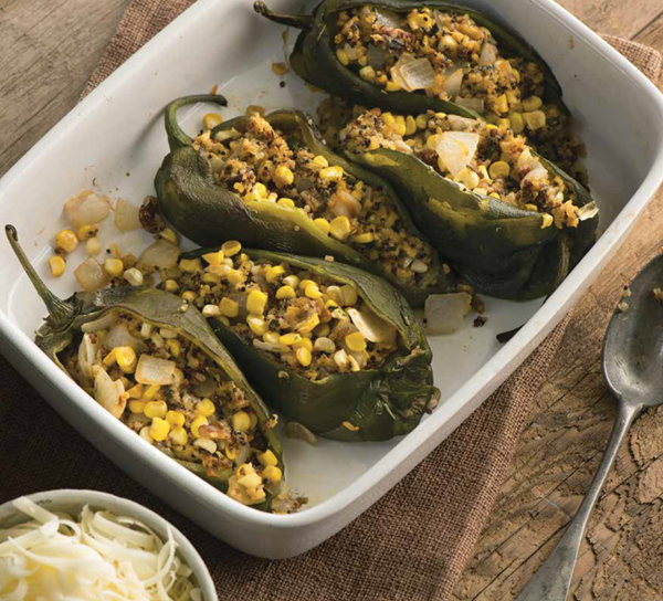 Roasted poblano chiles stuffed with quinoa, corn, and pecans