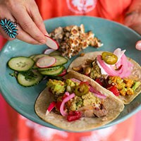 Roasted pork tacos with pumpkin seed sauce