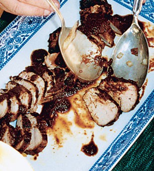 Roasted pork tenderloin with prune and ancho chile sauce