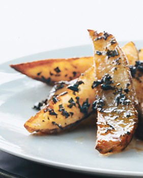 Roasted potato wedges with rosemary butter