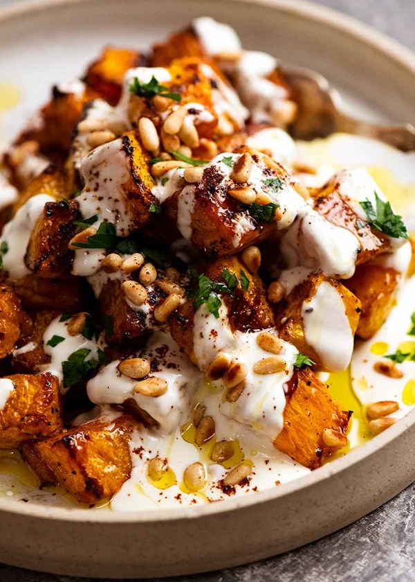 Roasted pumpkin with yogurt sauce and pine nuts