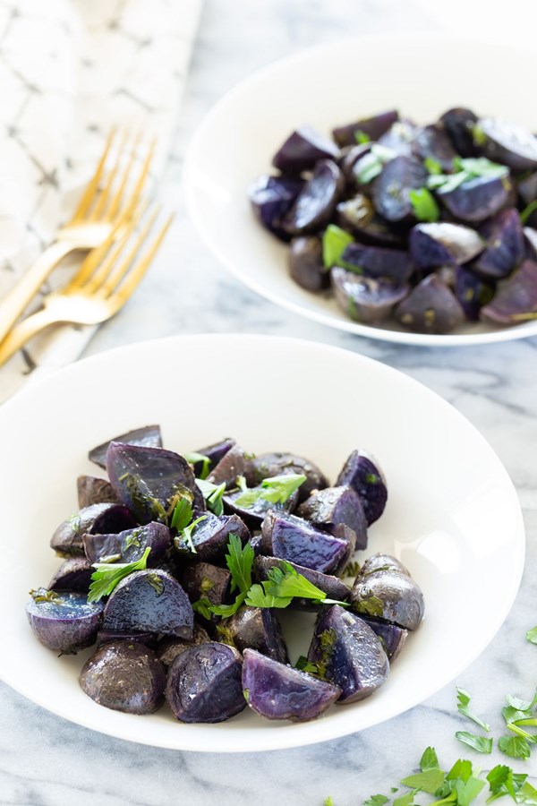 Roasted purple potatoes with garlic and cilantro