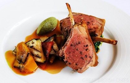 Roasted rack of English lamb with chargrilled Provencal vegetables, olive tapenade and basil pesto