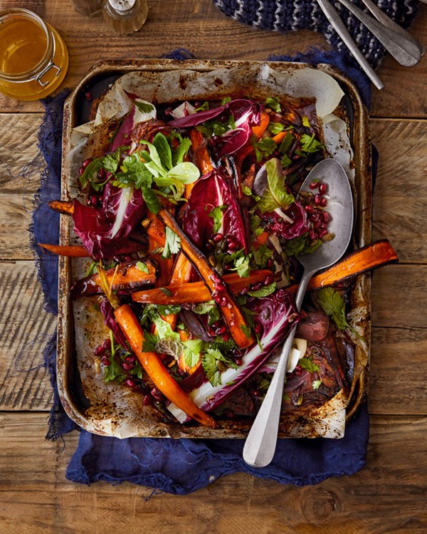 Roasted rainbow carrot, pomegranate & herb salad