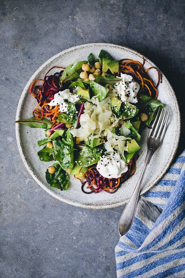 Roasted rainbow root tangles with yogurt and chickpea salad