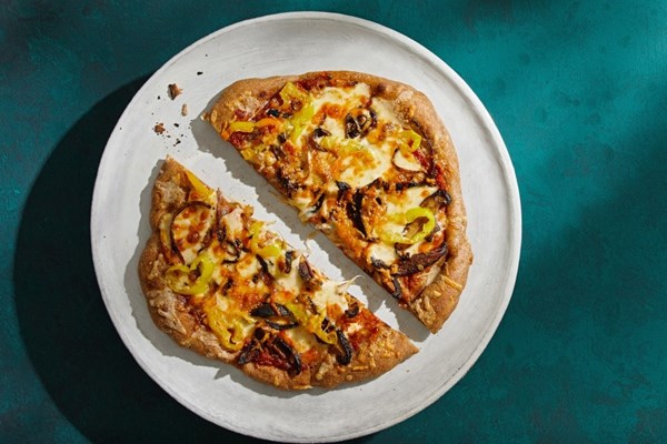 Roasted red pepper sauce pizza with mushrooms and smoked mozz