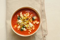Roasted red pepper soup with corn and cilantro