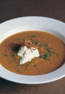 Roasted root soup with sizzled ginger and black pepper crème fraîche