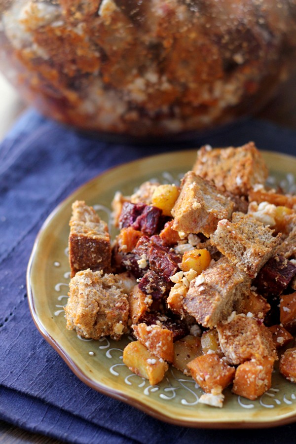 Roasted root vegetable panzanella with roasted red pepper pomegranate vinaigrette