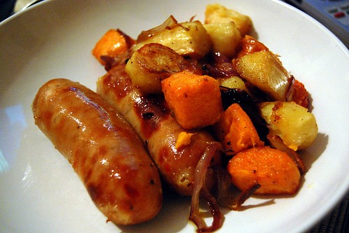Roasted root vegetables with sausages