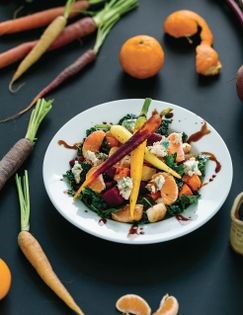 Roasted root veggie & kale salad with cashew blue cheese