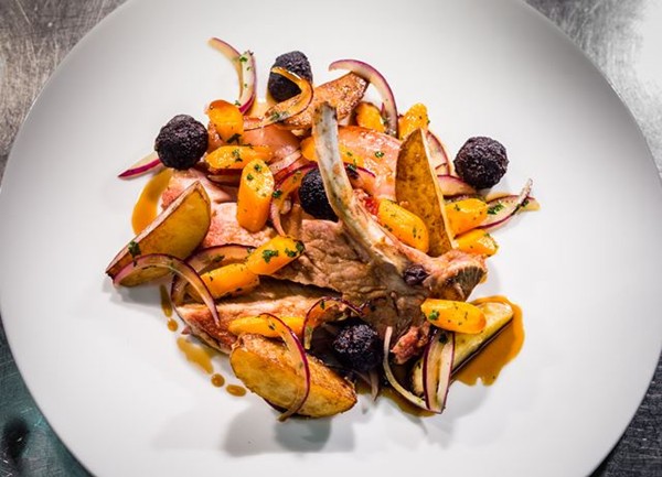 Roasted Saddleback pork chop with black pudding and new potatoes