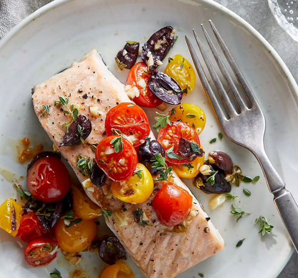 Roasted salmon & tomatoes with garlic & olives