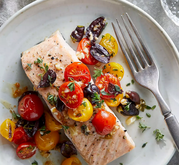 Roasted salmon & tomatoes with garlic & olives