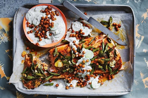 Roasted salmon with crispy curry butter sauce and cucumber and yoghurt dip