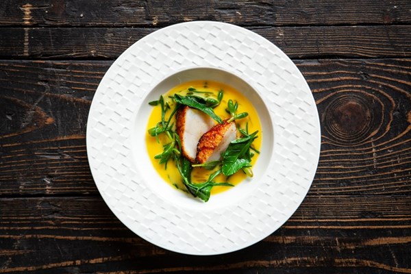 Roasted scallop with whey butter and sea herbs