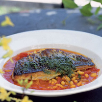 Roasted sea bass with beans, saffron, chilli and salmoriglio