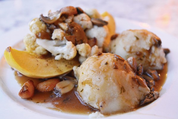 Roasted spaghetti squash, cauliflower, garlic, and mashed potatoes with porcini mushroom gravy