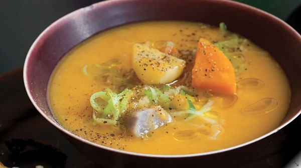 Roasted squash and apple chowder with colorful potatoes