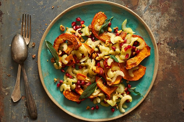 Roasted squash, celery, and pomegranate salad with toasted walnuts and fried sage