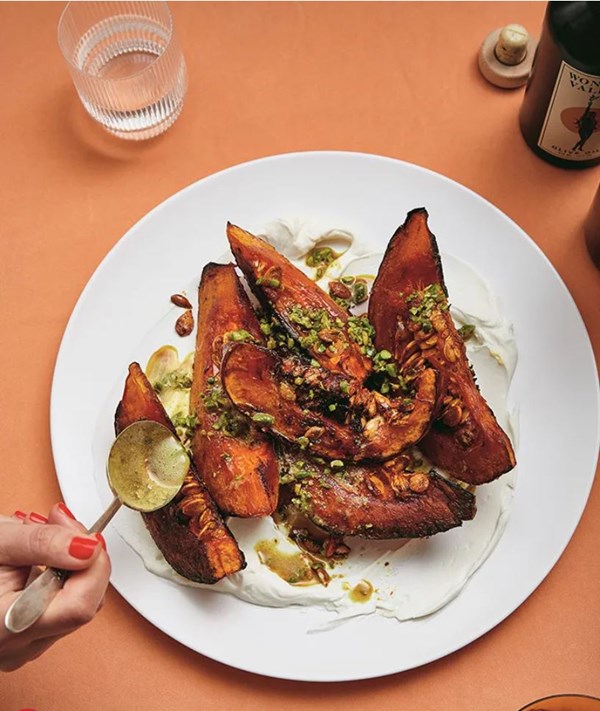 Roasted squash with yogurt and spiced, buttered pistachios