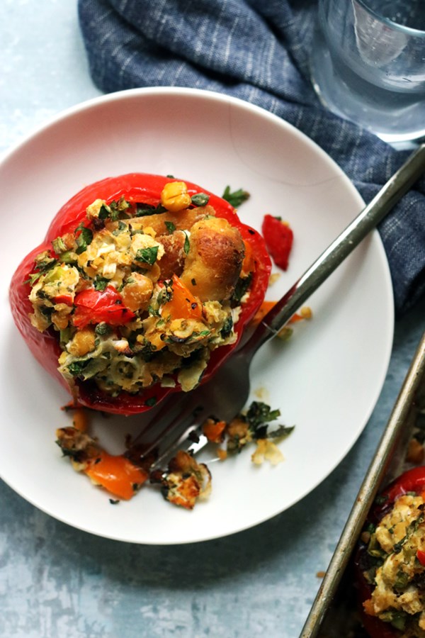 Roasted stuffed peppers with chickpeas, goat cheese, and herbs