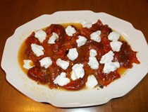 Roasted sweet peppers with sour orange vinaigrette and goat cheese