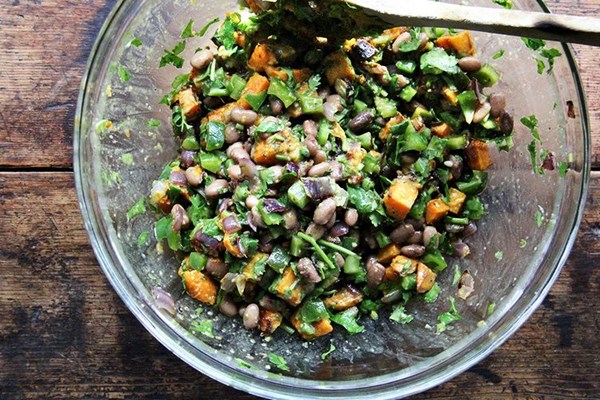 Roasted sweet potato and black bean salad with chile dressing