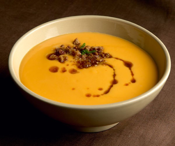 Roasted sweet potato soup with sorghum butter and duck cracklings