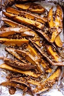Roasted sweet potatoes w/fried buckwheat + harissa