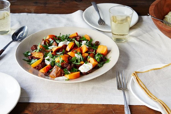 Roasted sweet potatoes with Merguez, persimmon, and za'atar yogurt