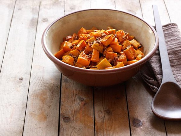 Roasted sweet potatoes with pecans and spiced maple sauce