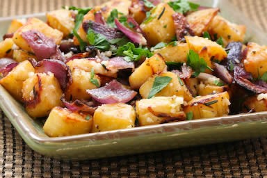 Roasted sweet potatoes with red onions, rosemary, and Parmesan