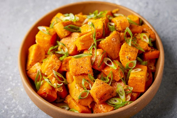 Roasted sweet potatoes with scallions and lime