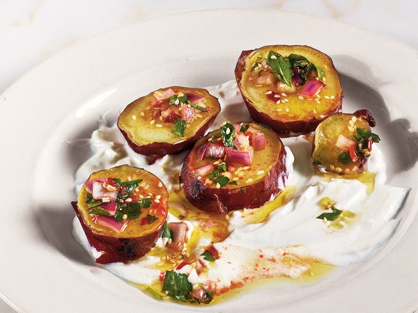 Roasted sweet potatoes with yogurt and sesame seeds