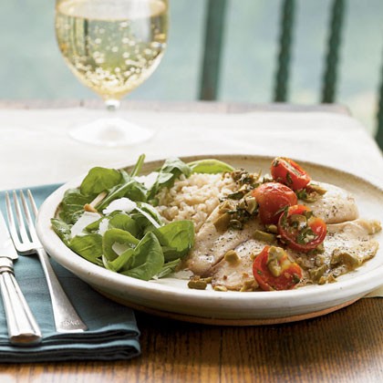 Roasted tilapia with tomatoes and olives