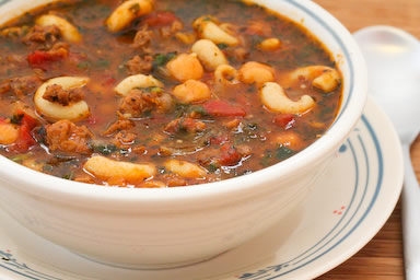 Roasted tomato soup with ground beef, sausage, garbanzos, macaroni, and basil